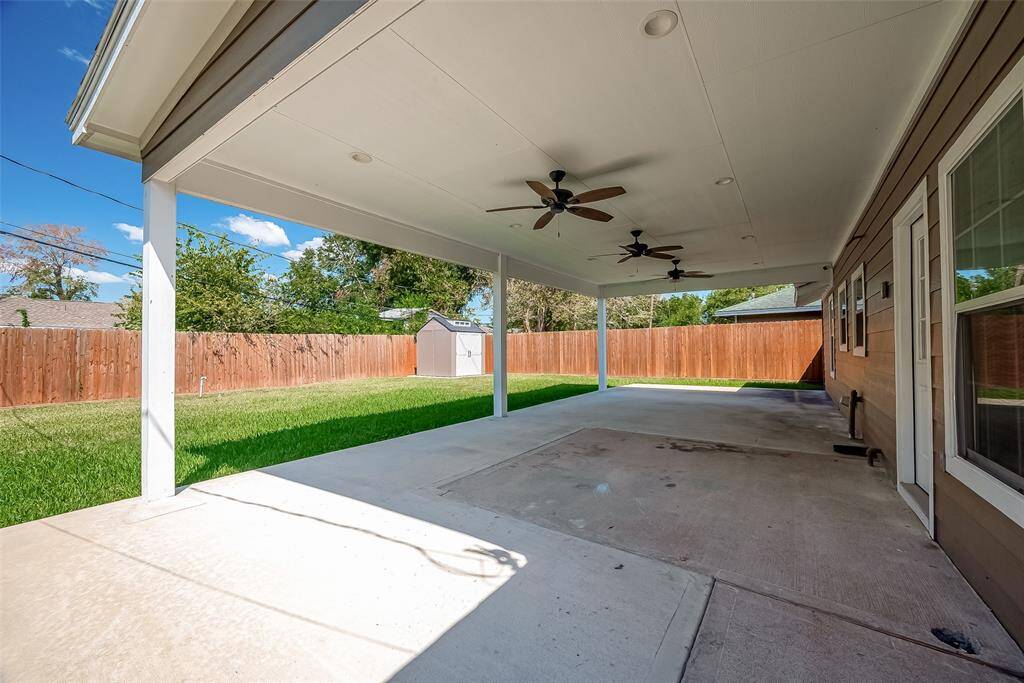 Awesome covered porch with 3 fans for ventilation