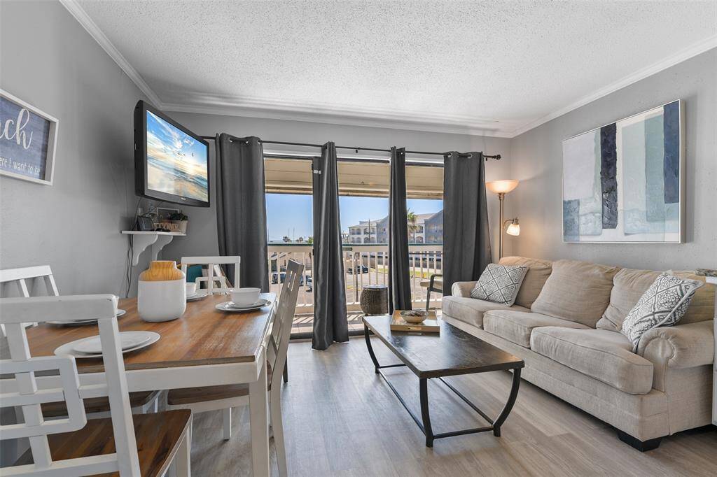 This thoughtfully designed living area maximizes space while keeping comfort at the forefront, with the ocean just outside your door.