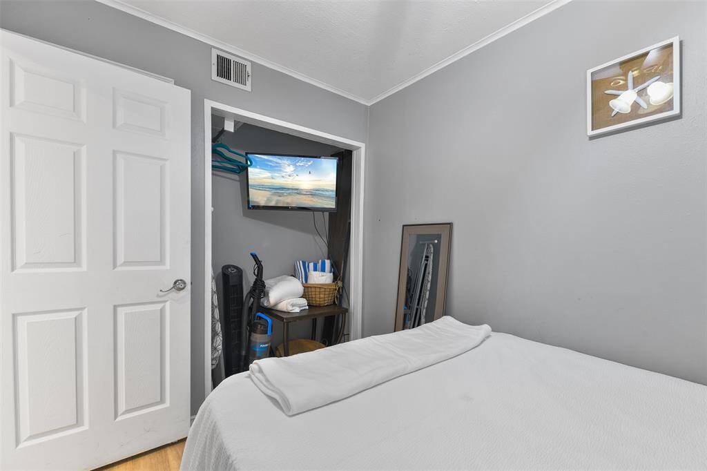 The bedroom provides a peaceful atmosphere with a well-utilized layout, featuring a small but functional closet to keep your essentials organized.
