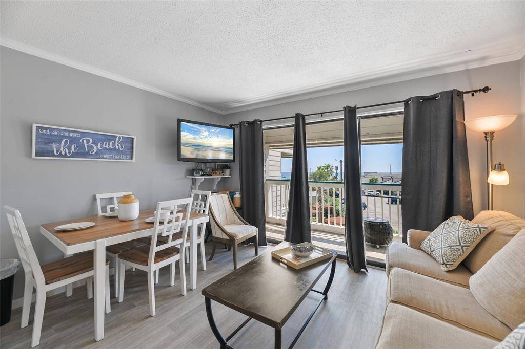 Step out from the shared living space onto your private balcony, where the beauty of the beach is always within view.