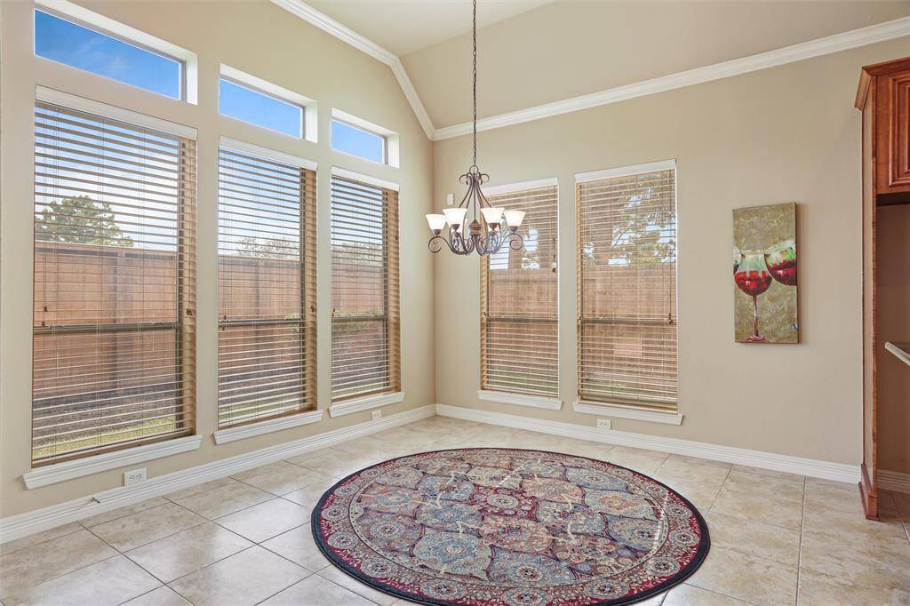Sunny Breakfast Nook with Floor-to-Ceiling Windows