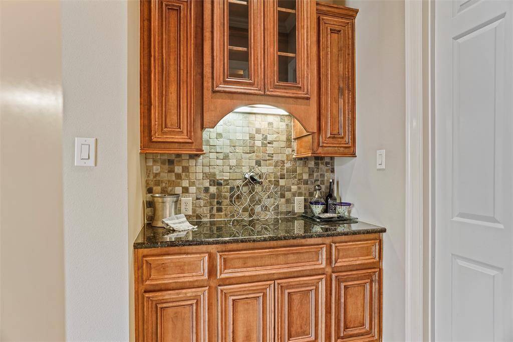 Enjoy the convenience of a bar area adjacent to the garage for easy grocery unloading.