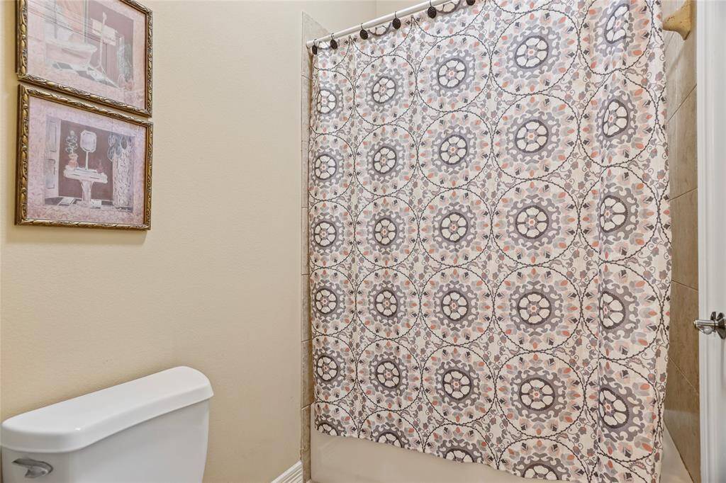 Charming Guest Bathroom with Designer Accents