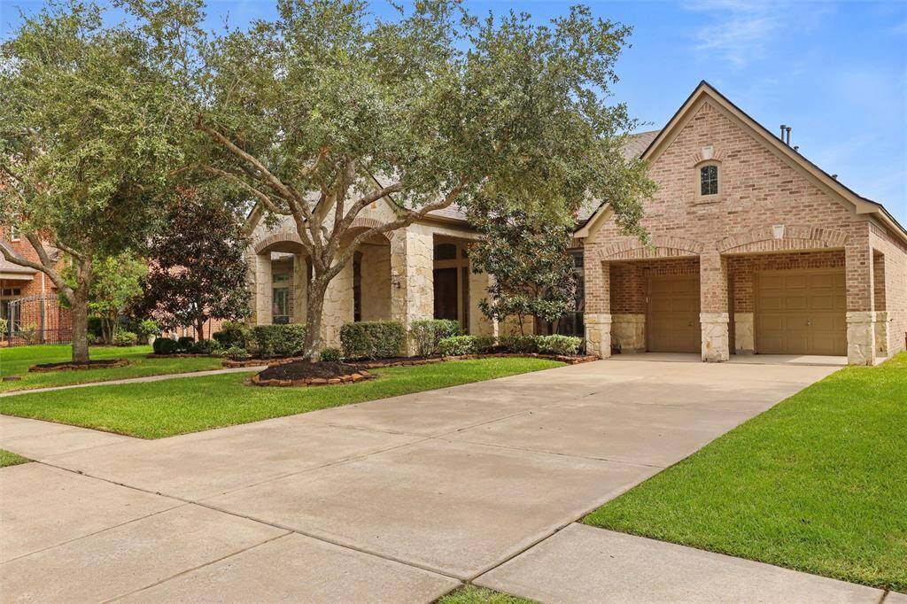 Enjoy ample parking with a spacious driveway, convenient carport, and a generous 3-car garage, perfect for vehicles and storage.