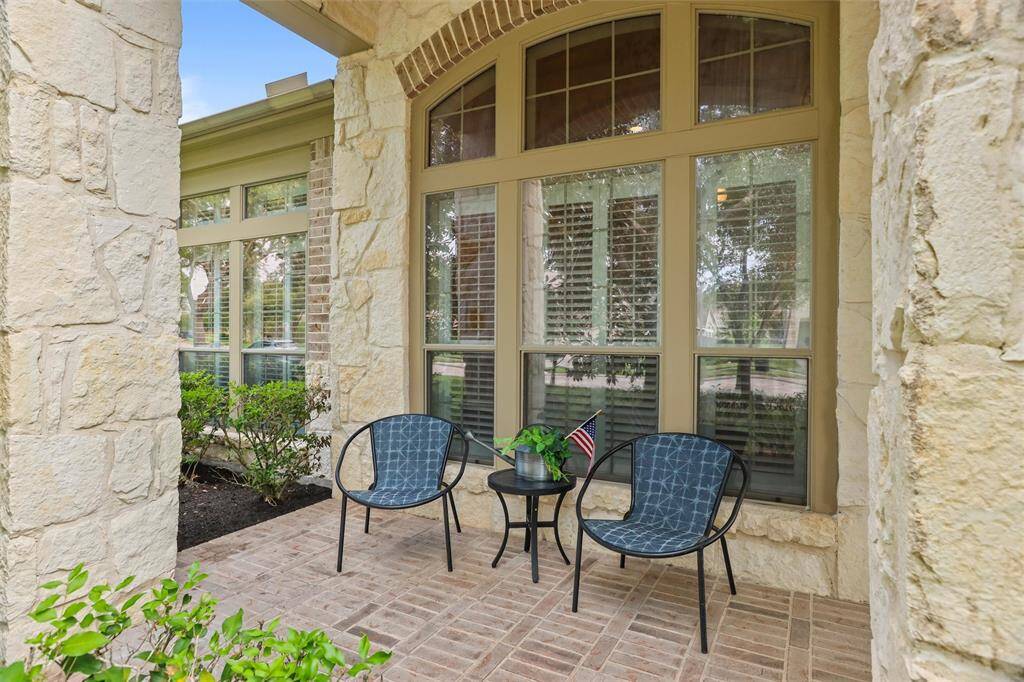 Relax on your charming porch during the serene spring afternoons.