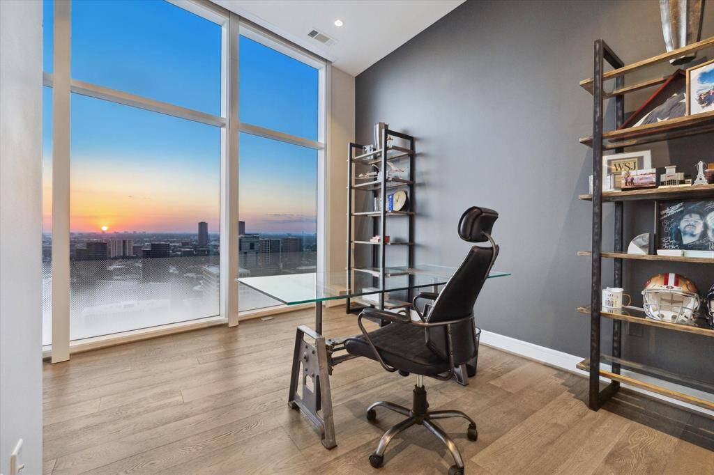 Another view of the Modern Home Office with Floor-to-Ceiling Windows and Breathtaking Sunset Views