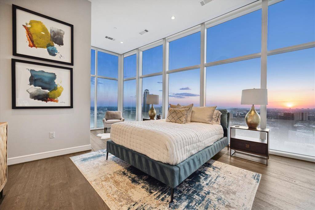 Chic guest bedroom boasting breathtaking panoramic views.