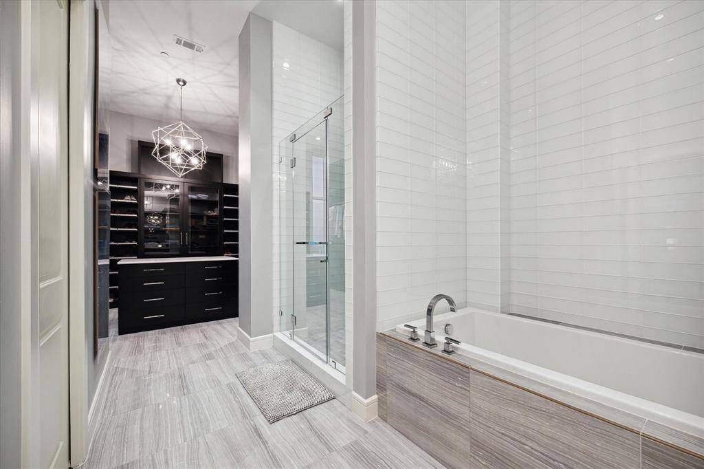Elegant Ensuite with view to Expansive Walk-In Closet
