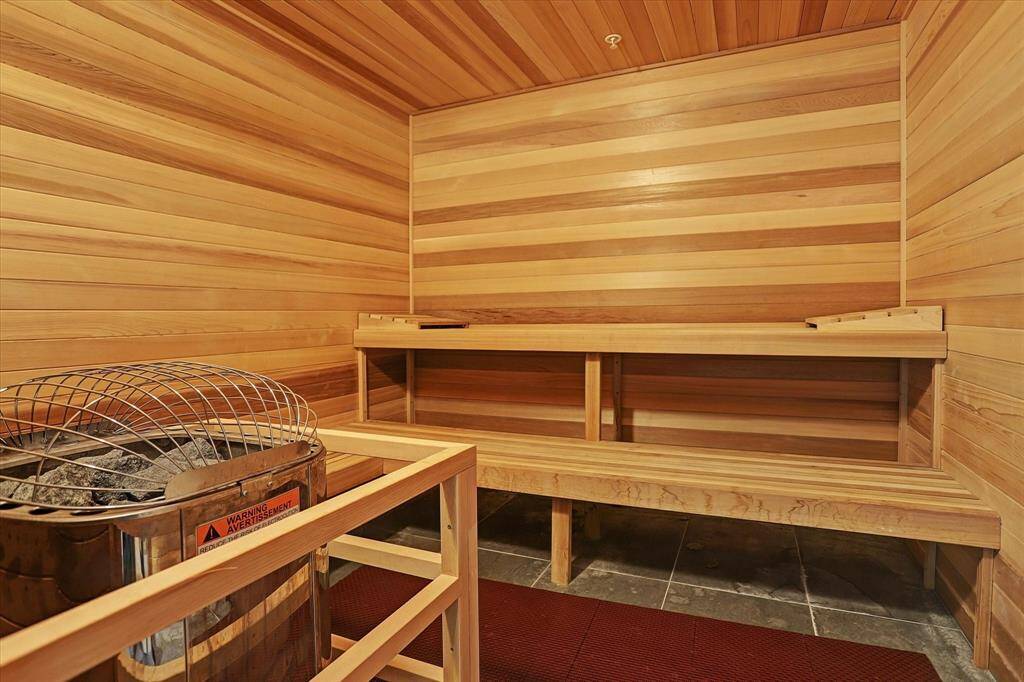 Sauna with elegant wood paneling—your serene retreat for relaxation and rejuvenation.