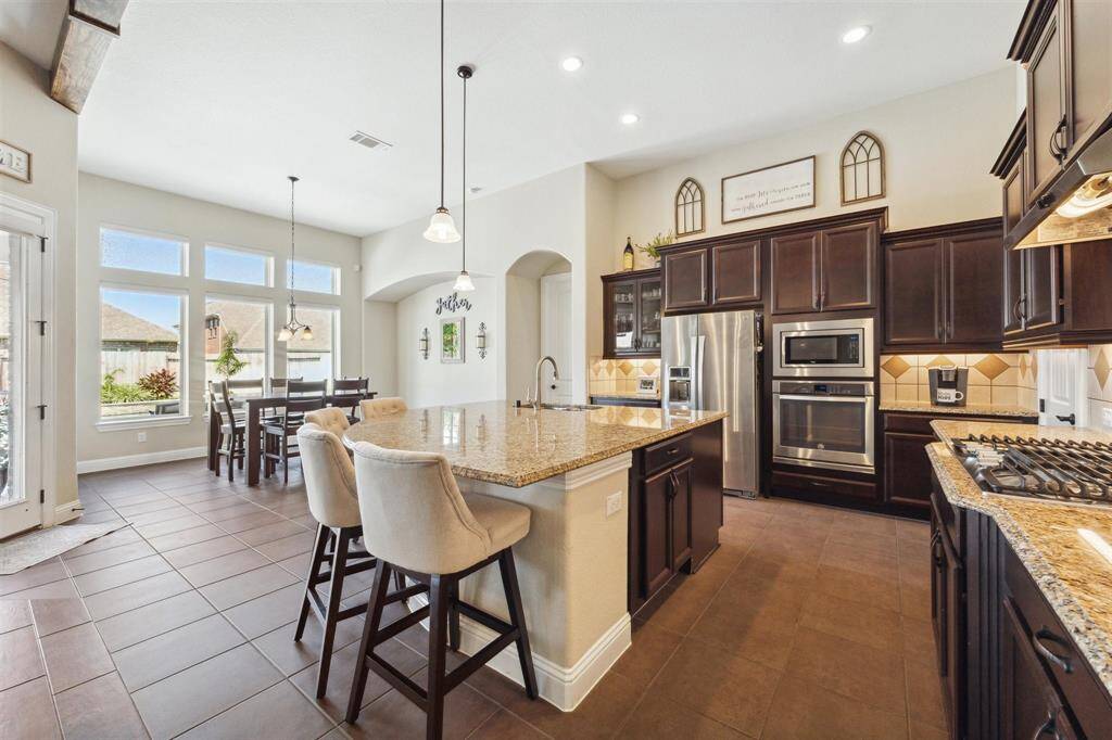 Stainless steal appliances, gas range, upgraded venthood, ORB fixtures.