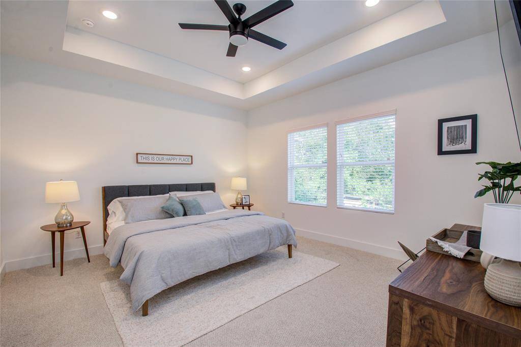 Elegant Primary Bedroom located on the 2nd floor. The high ceilings, with recessed lighting, are prewired and blocked for ceiling fans (not included). Model home photos, finishes and floor plan MAY VARY! Ceiling fans are NOT INCLUDED!