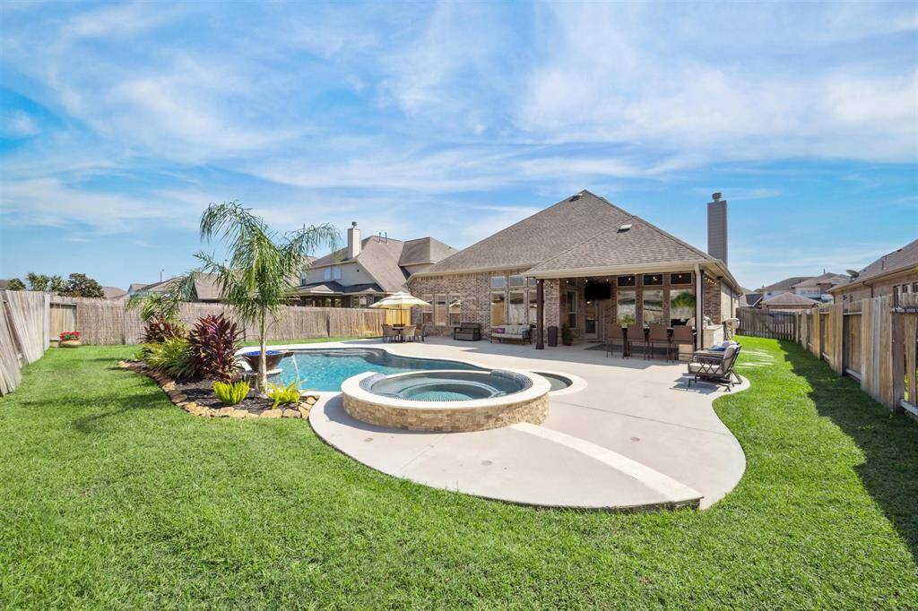 Back view of your all brick one story home.