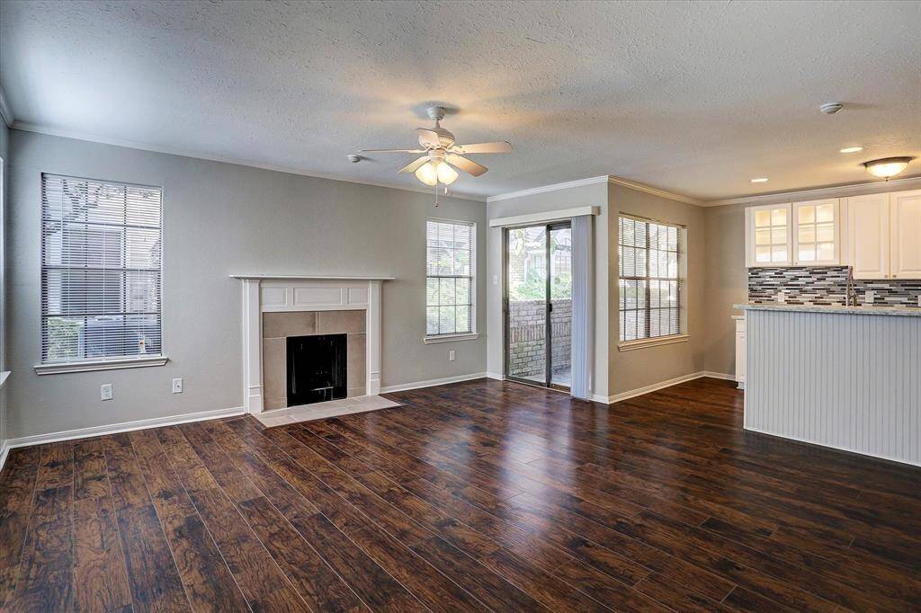 Large living/dining space with cozy fireplace