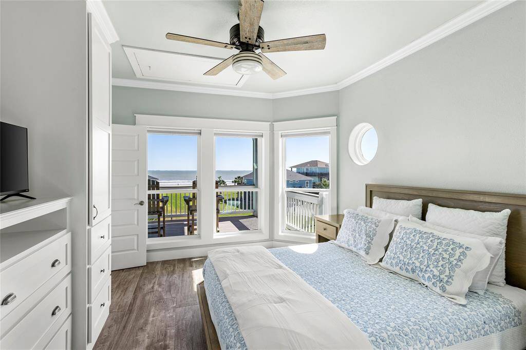 2nd floor bright ocean view bedroom on right side of the the beach house with connected bath.