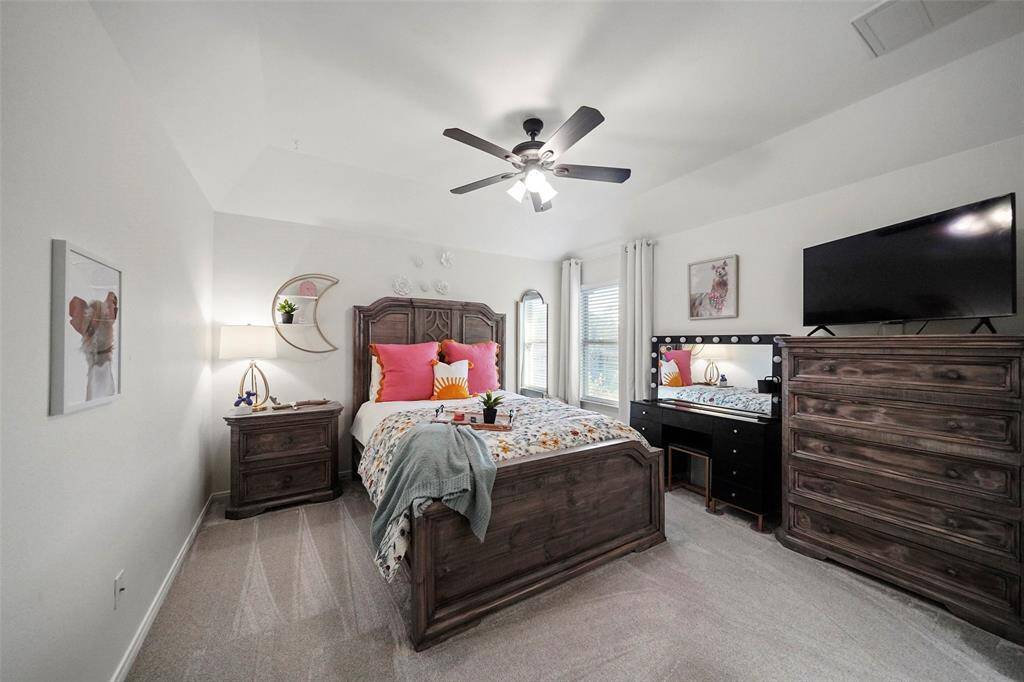 One of three guest bedrooms on the second floor. This room connects to a jack and jill bath.