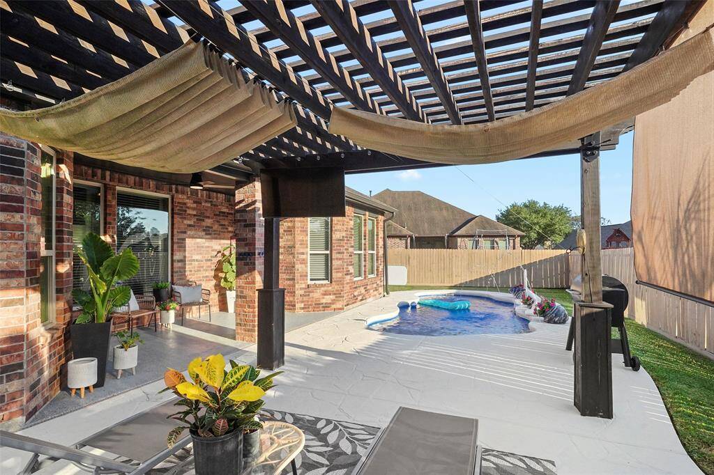 Back patio is large enough for several seating areas.