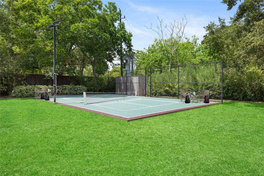 [Virtual Rendering - Pickleball Court] Elevate your game with this versatile Pickleball Court transformation from the existing sports court. Perfect for hosting tournaments or casual play, it's your personal arena for competition, fun, and mastering the fastest-growing sport in your own backyard!