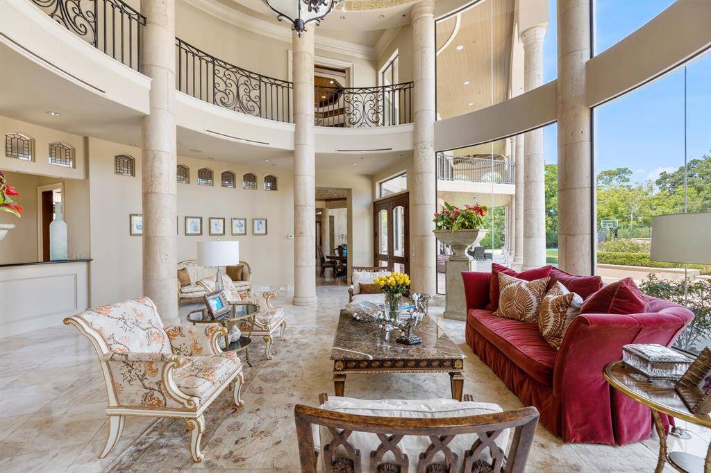 [Living Room] A grand setting with wonderful scale is the formal Living Room with views of the Back Yard.