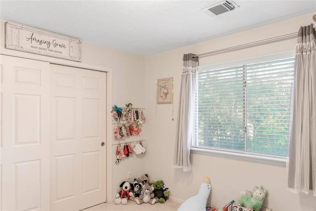 Third bedroom with window for natural light and closet