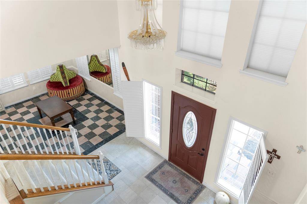 A versatile room downstairs can serve as either an office or a formal dining room.