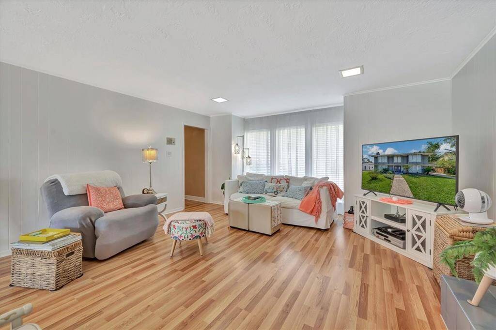 Another view of the spacious family room.  This home has been loved and used for so many family and friend gatherings,  especially Christmas and holiday time welcoming Christmas caroling, story telling and family movie and game nights.