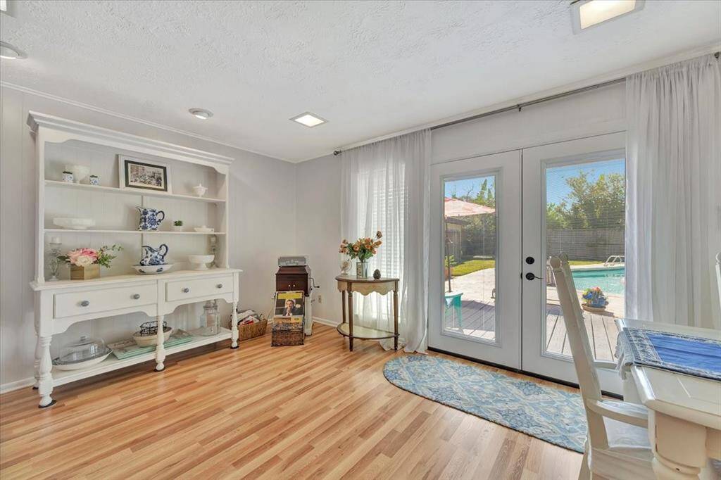 The kitchen has been remodeled and opened up to the eating area and family room and offers a great eating bar as well.