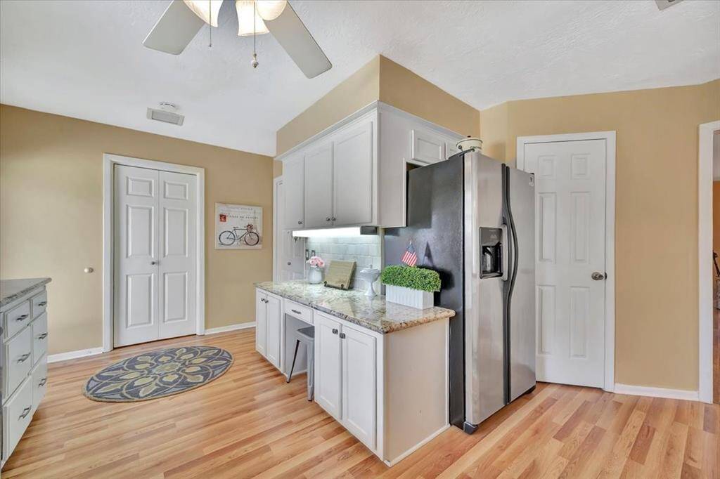 Downstairs is a powder bath.