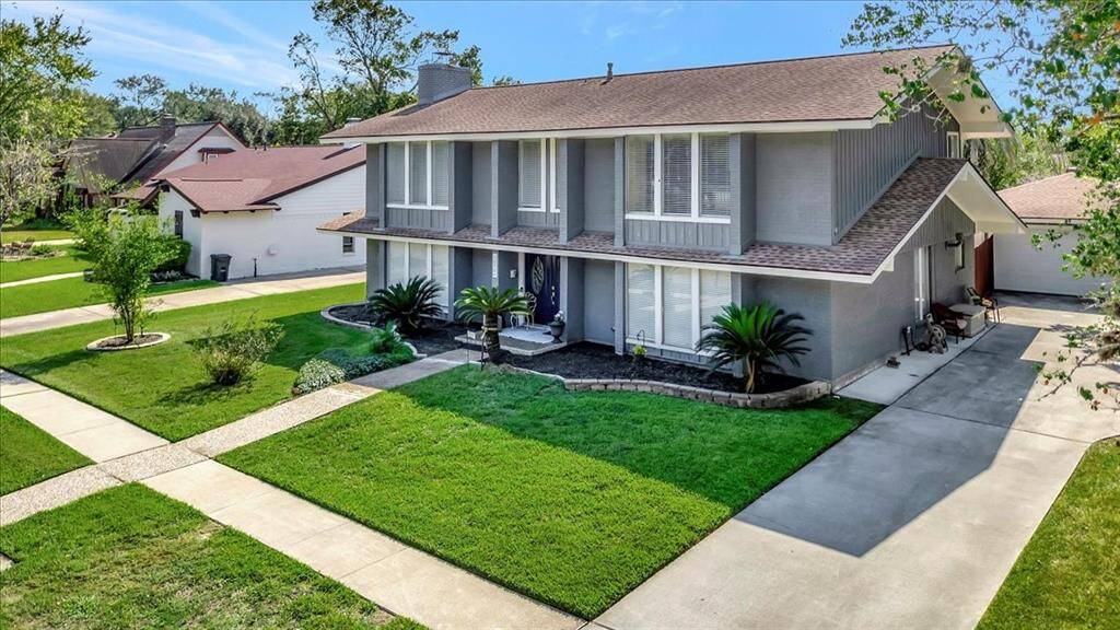 Recently replaced driveway and added space.