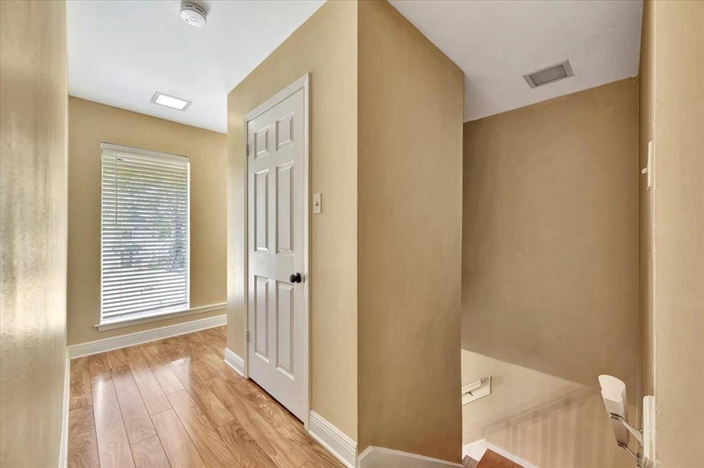 This spacious primary suite offers lots of options for oversize furniture.