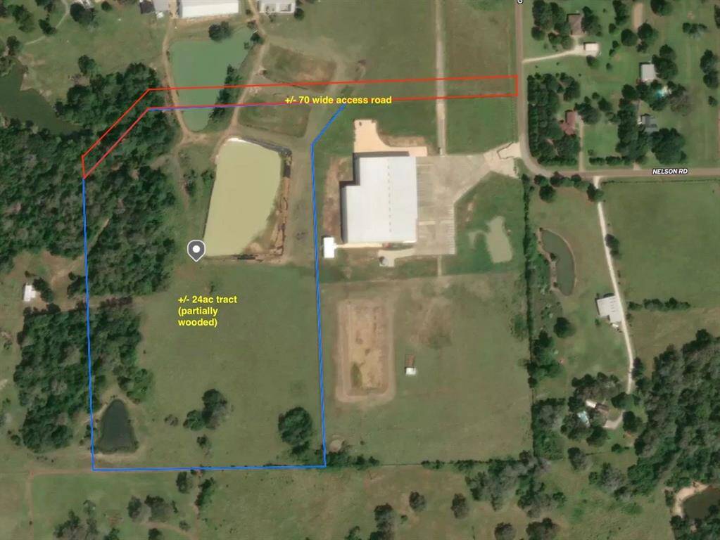 +/- 24 ac lot (partially wooded) with access driveway from Nelson Road.