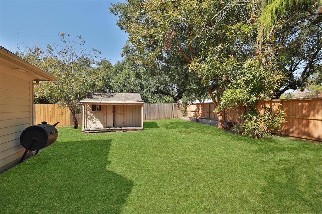 Shed is included and perfect for lawn mower and yard equipment storage.