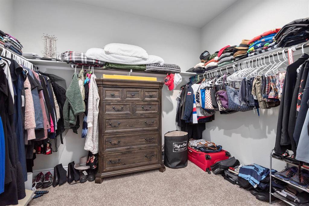 Huge primary closet finishes off this En-suite Primary bath!