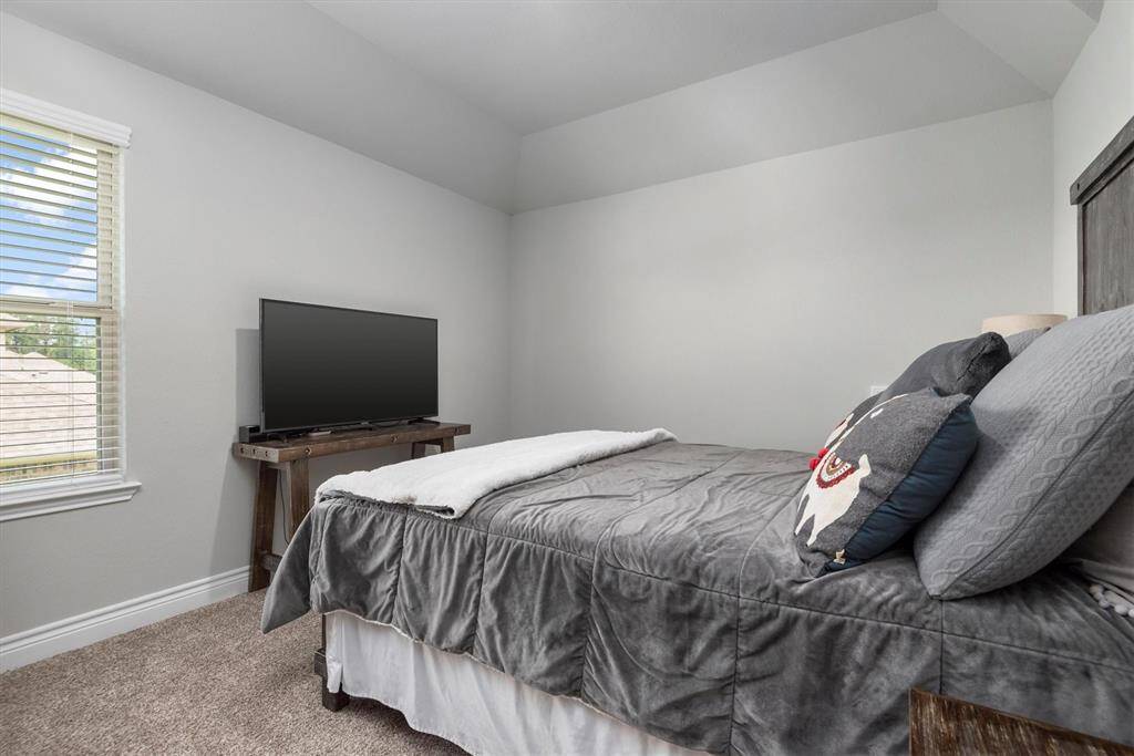Secondary upstairs bedroom 4 has a huge walk in closet!