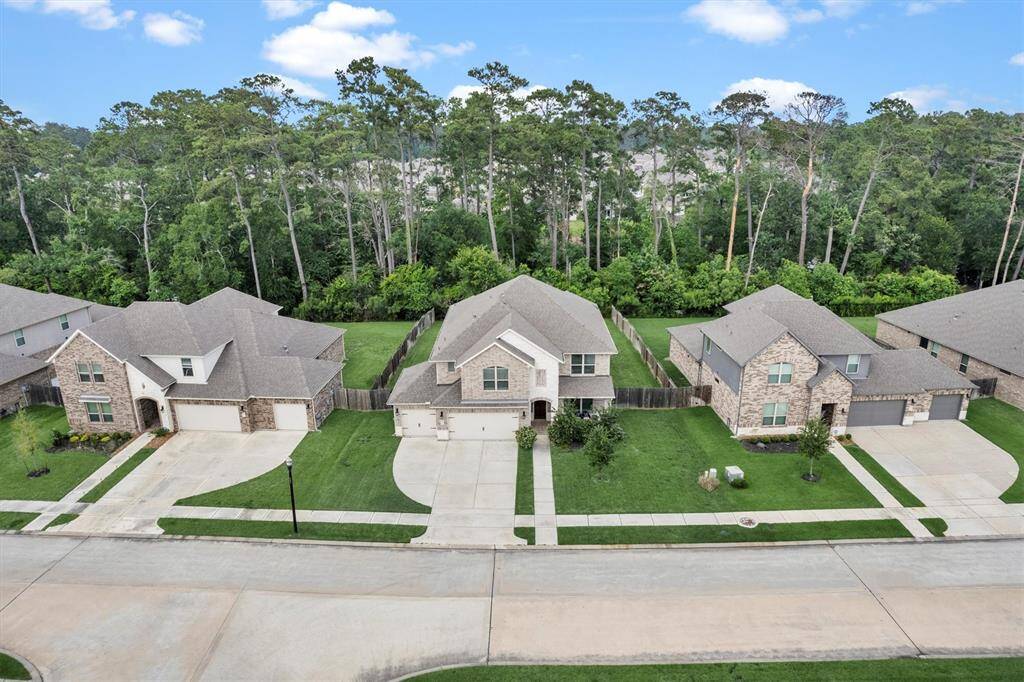 Backs up to canal with row of trees and no rear neighbors.