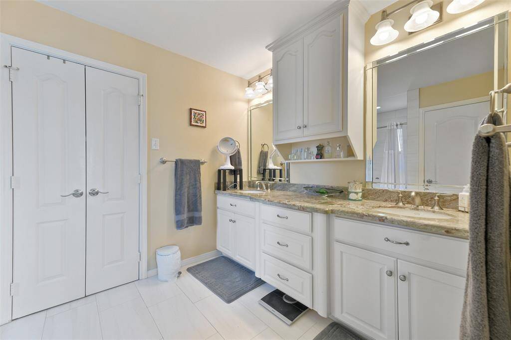 Primary Bath with dual sinks and walk-in closet