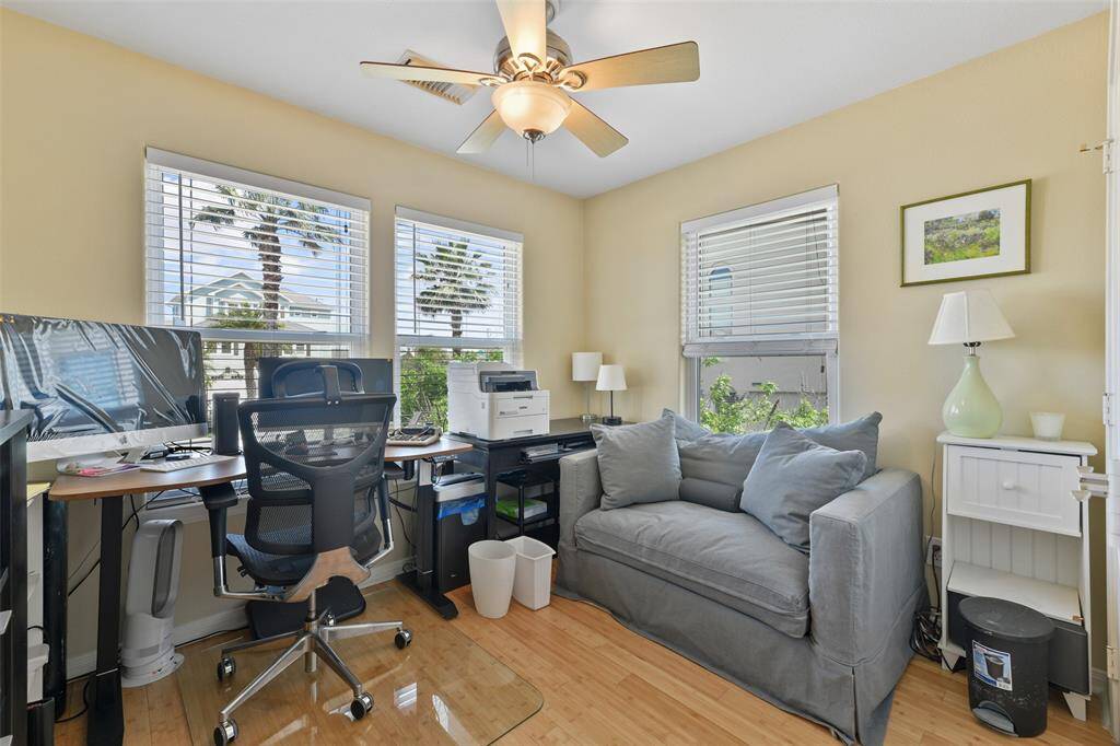 Guest #2 is currently utilized as an office space. Couch pictured does convert into a single bed. Double or Queen would also fit.
