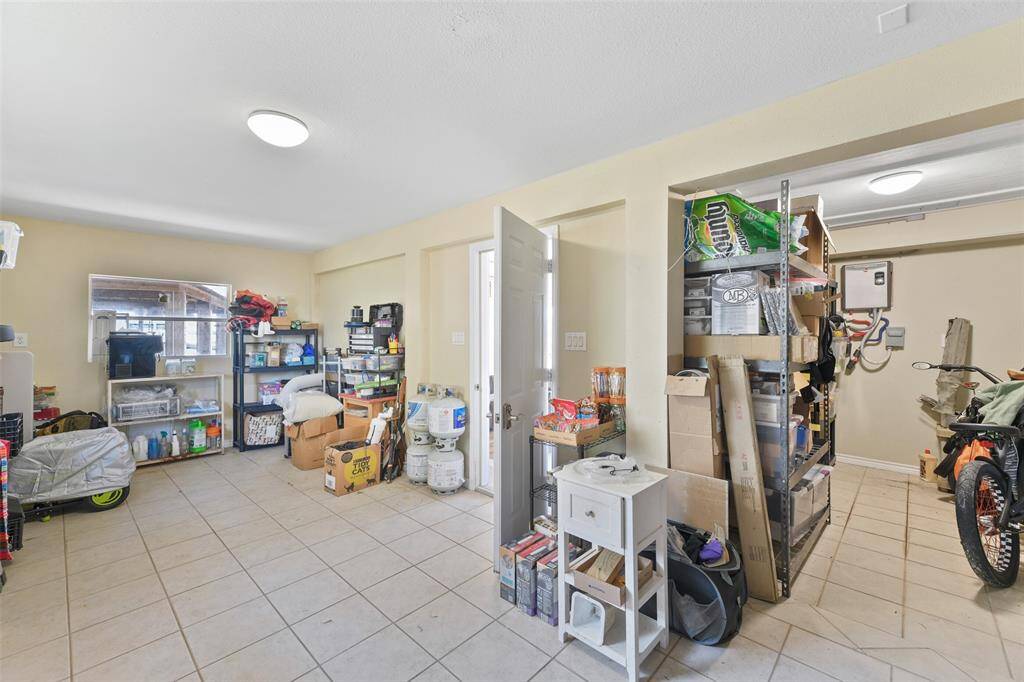 Downstairs enclosed space is perfect for watersports storage, additional goods, or convert into an outdoor bar.