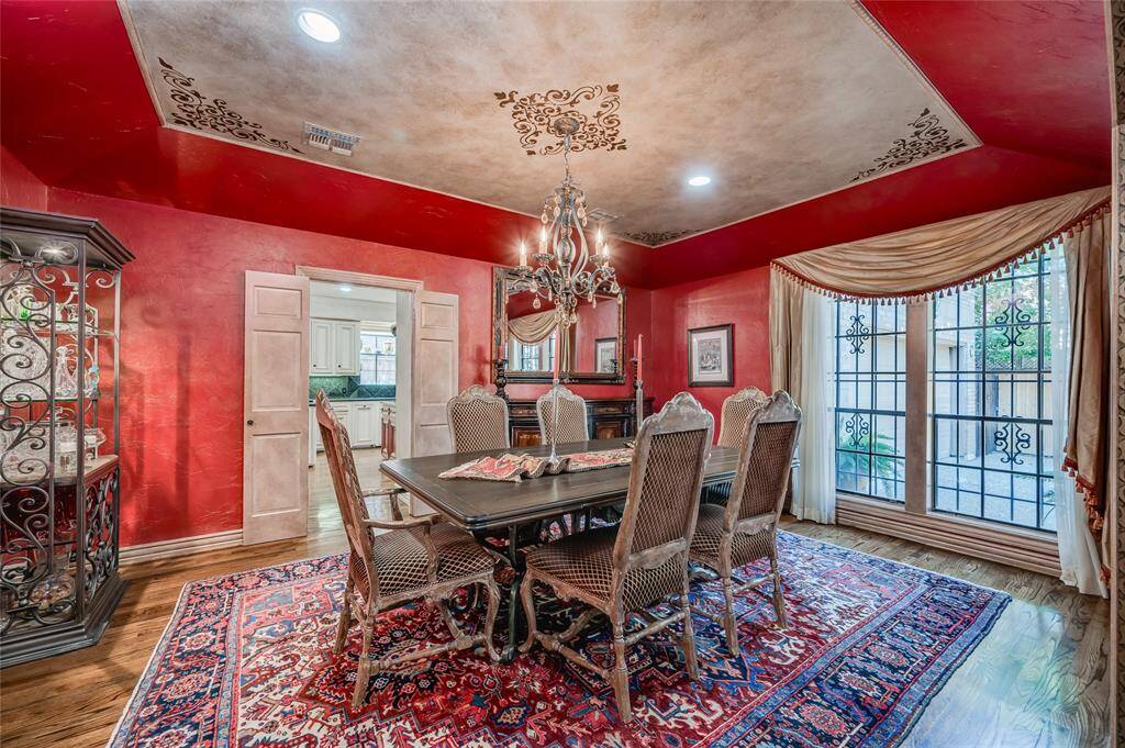 Entertain like royals in the showstopping dining room, complete with shutter doors that open to the chef’s kitchen.