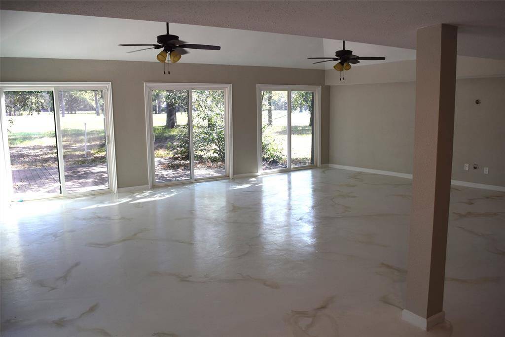 LIVING ROOM WITH VIEW OF GOLF COURSE