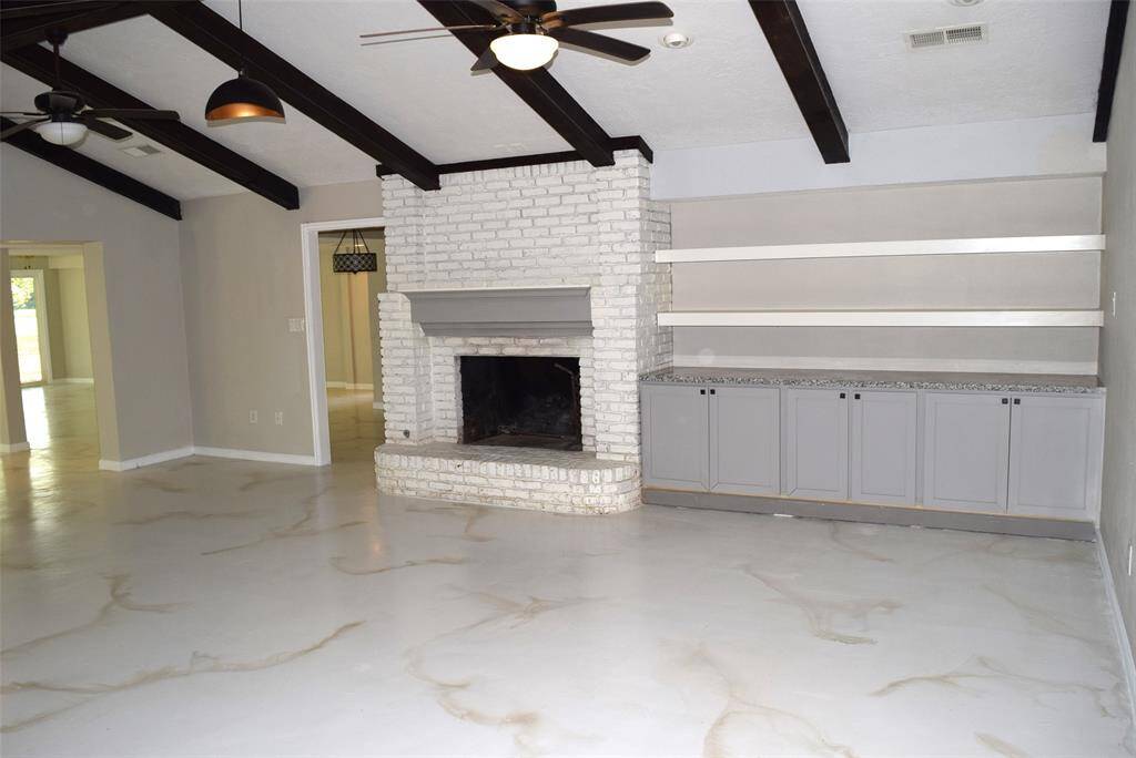 FLOOR TO CEILING BRICK FIREPLACE