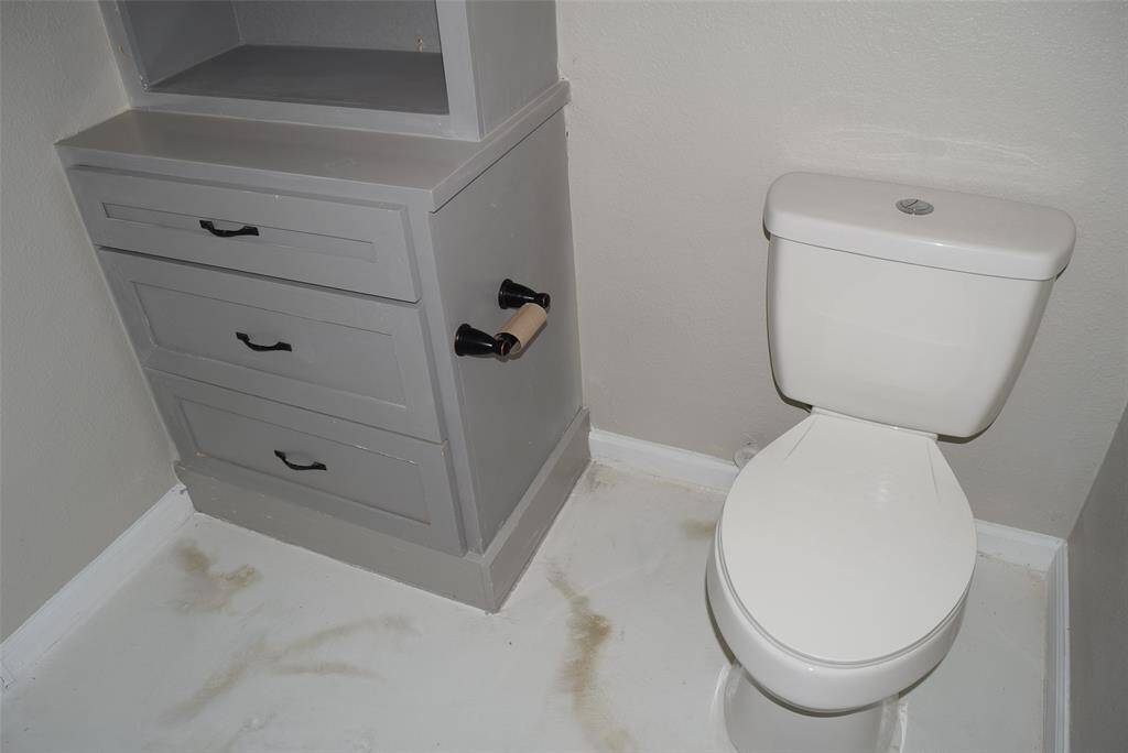 TOILET AREA WITH BUILT IN