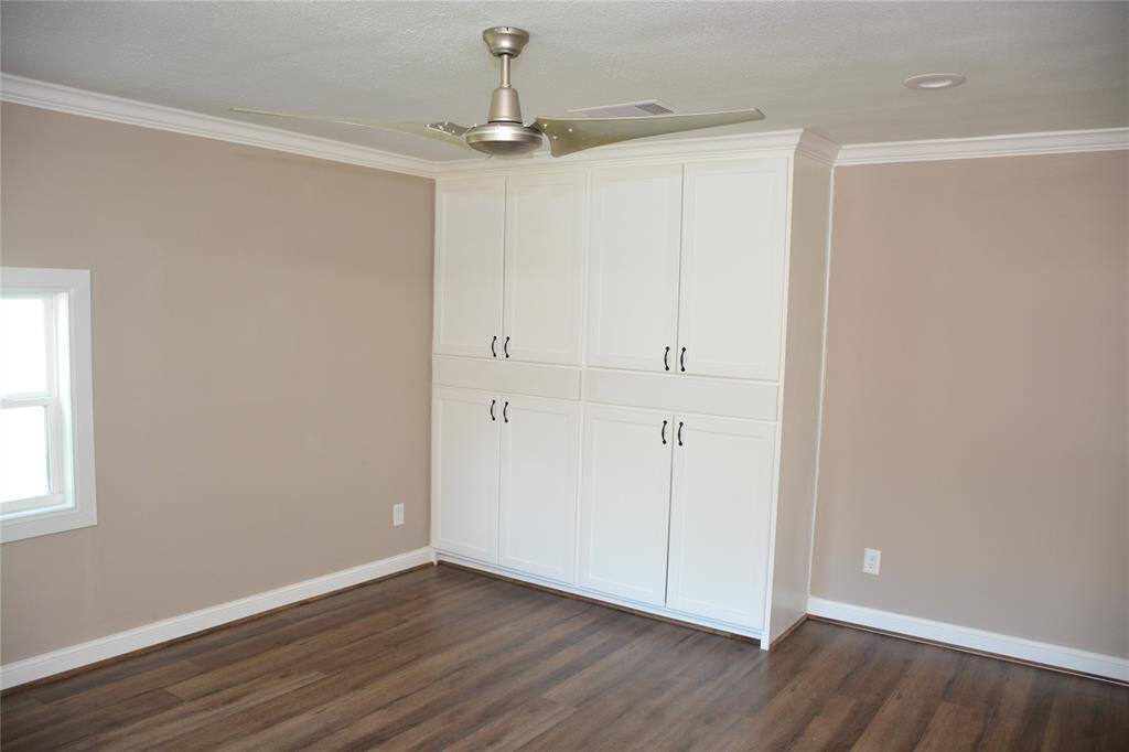 Second bedroom with beutiful quality built ins