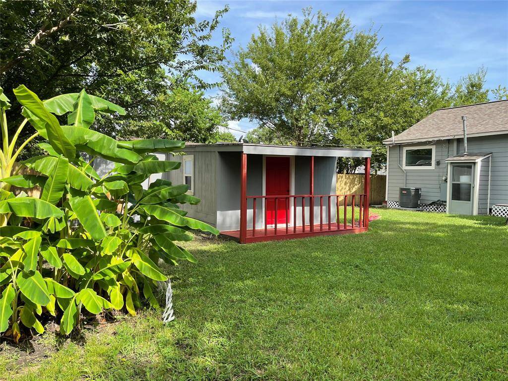 Apartment has a back porch to enjoy the yard