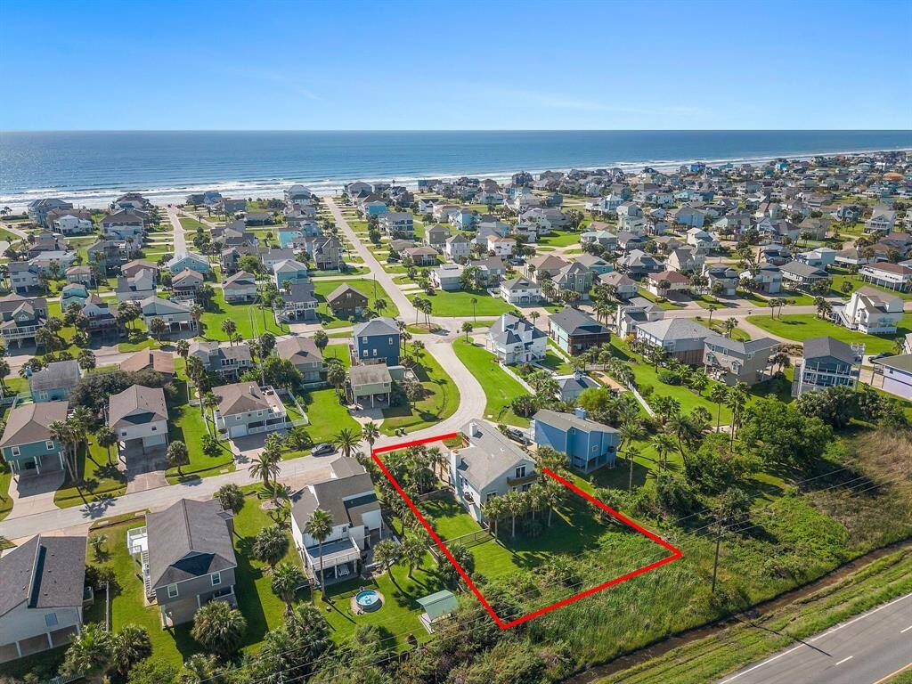Picture this: your own slice of island paradise outlined in red—because yes, this is the one you’ve been dreaming about! Nestled just blocks from the beach, this oversized lot boasts room to spread out, play, relax, and soak in those salty breezes.