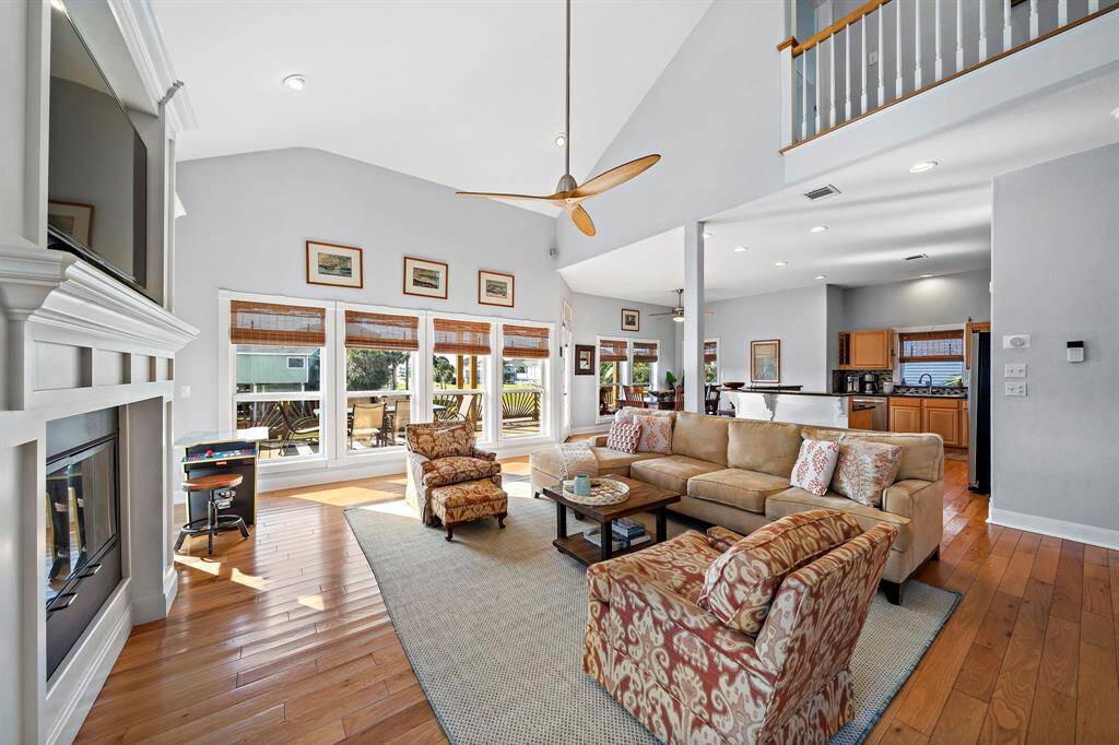 From this perspective, the seamless transition between the living, dining, and kitchen spaces is on full display. Ideal for entertaining, this layout offers both function and flow, with stylish finishes throughout.