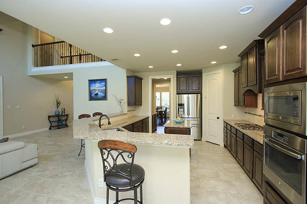 Another view from the breakfast area to kitchen and entry.