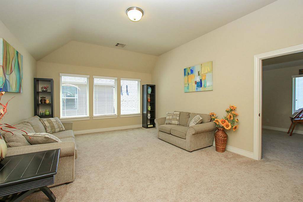 Upstairs game room with access to the media room.