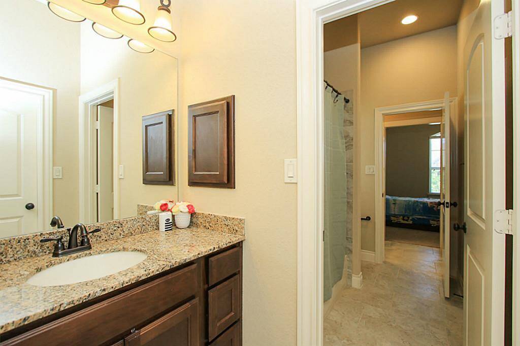 Jack and Jill bath connecting the nice-sized 3rd and 4th bedroom.