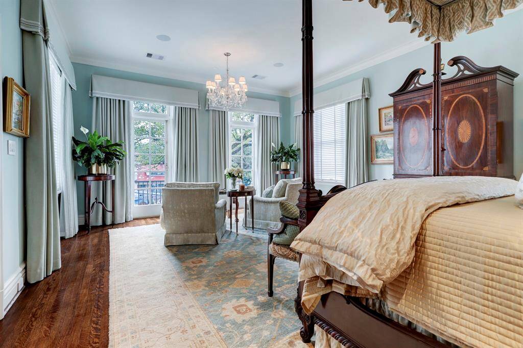 Another view of primary suite looking out onto the sitting area that looks out onto the breathtaking gardens.Such a serene setting.