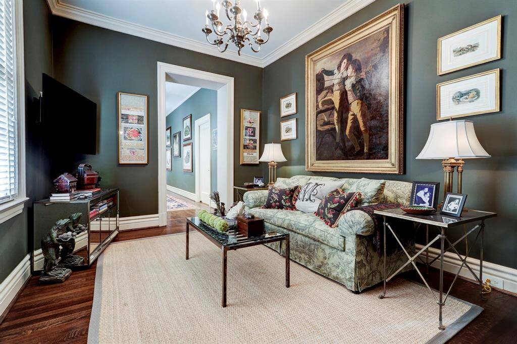 New upstairs sitting area that connects hall to the original house to new wide hall with newly added laundry room and new bedroom and bath.  An absolutely seamless addition in keeping with the original architecture of the home.